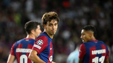 Barcelona's Portuguese forward #14 Joao Felix celebrates after scoring his team's fifth goal during the UEFA Champions League 1st round day 1 Group H football match between FC Barcelona and Royal Antwerp FC at the Estadi Olimpic Lluis Companys in Barcelona on September 19, 2023. (Photo by Josep LAGO / AFP)