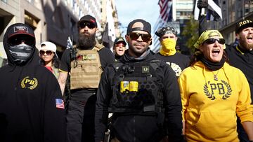 Members of the far-right Proud Boys, including leader Enrique Tarrio (C), rally in support of Donald Trump to protest the results of the 2020 presidential election, in Washington, D.C.. November 14, 2020.