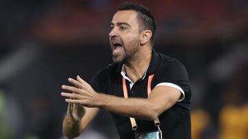 Sadd&#039;s coach Xavi reacts during the 2019 FIFA Club World Cup football match between Qatar&#039;s Al-Sadd and New Caledonia&#039;s Hienghene Sport at the Jassim Bin Hamad Stadium in the Qatari capital Doha on December 11, 2019. (Photo by KARIM JAAFAR 