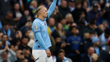 Soccer Football - Premier League - Manchester City v Arsenal - Etihad Stadium, Manchester, Britain - September 22, 2024 Manchester City's Erling Haaland celebrates scoring their first goal Action Images via Reuters/Jason Cairnduff EDITORIAL USE ONLY. NO USE WITH UNAUTHORIZED AUDIO, VIDEO, DATA, FIXTURE LISTS, CLUB/LEAGUE LOGOS OR 'LIVE' SERVICES. ONLINE IN-MATCH USE LIMITED TO 120 IMAGES, NO VIDEO EMULATION. NO USE IN BETTING, GAMES OR SINGLE CLUB/LEAGUE/PLAYER PUBLICATIONS. PLEASE CONTACT YOUR ACCOUNT REPRESENTATIVE FOR FURTHER DETAILS..