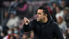 Barcelona's Spanish coach Xavi gestures during the Spanish League football match between FC Barcelona and Cadiz CF at the Camp Nou stadium in Barcelona on April 18, 2022. (Photo by LLUIS GENE / AFP) (Photo by LLUIS GENE/AFP via Getty Images)