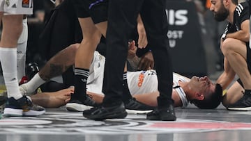Real Madrid�s Gabriel Deck lies injured during the Euroleague basketball quarter-final match between Partizan Belgrade and Real Madrid at the �Stark Arena� in Belgrade on May 4, 2023 (Photo by ANDREJ ISAKOVIC / AFP)