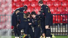 GRANADA, SPAIN - FEBRUARY 03: Antoine Griezmann of FC Barcelona celebrates with team mates after scoring his team&#039;s third goal during the Copa del Rey match between Granada and Barcelona at Estadio Nuevo Los Carmenes on February 03, 2021 in Granada, 