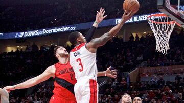 Dec 5, 2017; Portland, OR, USA; Washington Wizards guard Bradley Beal (3) shoots over Portland Trail Blazers center Jusuf Nurkic (27) during the first quarter at the Moda Center. Mandatory Credit: Craig Mitchelldyer-USA TODAY Sports