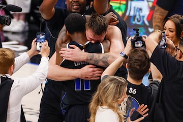 Luka Doncic hugs Kyrie Irving after defeating the Oklahoma City Thunder in the Western Conference Semifinal.