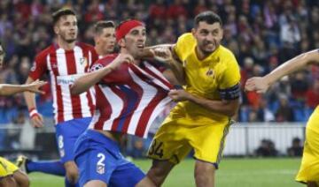 Diego Godin  y Aleksandr Gatskan