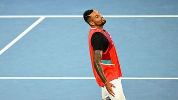 Australia's Nick Kyrgios celebrates after beating Britain's Liam Broady in their men's singles match on day two of the Australian Open tennis tournament in Melbourne on January 18, 2022. (Photo by MICHAEL ERREY / AFP) / -- IMAGE RESTRICTED TO EDITORIAL USE - STRICTLY NO COMMERCIAL USE --