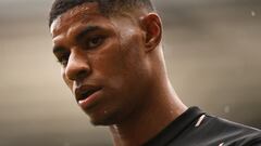 Manchester United's English striker Marcus Rashford reacts as he arrives on the pitch prior to the English Premier League football match between Manchester United and Aston Villa at Old Trafford in Manchester, north west England, on April 30, 2023. (Photo by Oli SCARFF / AFP) / RESTRICTED TO EDITORIAL USE. No use with unauthorized audio, video, data, fixture lists, club/league logos or 'live' services. Online in-match use limited to 120 images. An additional 40 images may be used in extra time. No video emulation. Social media in-match use limited to 120 images. An additional 40 images may be used in extra time. No use in betting publications, games or single club/league/player publications. / 