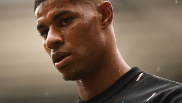 Manchester United's English striker Marcus Rashford reacts as he arrives on the pitch prior to the English Premier League football match between Manchester United and Aston Villa at Old Trafford in Manchester, north west England, on April 30, 2023. (Photo by Oli SCARFF / AFP) / RESTRICTED TO EDITORIAL USE. No use with unauthorized audio, video, data, fixture lists, club/league logos or 'live' services. Online in-match use limited to 120 images. An additional 40 images may be used in extra time. No video emulation. Social media in-match use limited to 120 images. An additional 40 images may be used in extra time. No use in betting publications, games or single club/league/player publications. / 