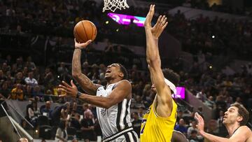 Oct 27, 2018; San Antonio, TX, USA; San Antonio Spurs guard DeMar DeRozan (10) shoots the ball past Los Angeles Lakers center JaVale McGee (7) during the second quarter at AT&amp;T Center. Mandatory Credit: John Glaser-USA TODAY Sports