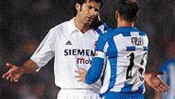 <b>EN PAZ</B>. Figo y Fran conversan durante el partido de ayer. El empate hizo justicia a lo sucedido.