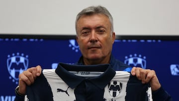 Mexico's Monterrey football team new head coach, Spanish Domenec Torrent holds his new jersey during his presentation at the Monterrey Club training center, in Monterrey, state of Nuevo Leon, Mexico, on May 26, 2025. (Photo by Julio Cesar AGUILAR / AFP)