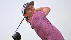 Australia's Cameron Smith watches his drive from the 15th tee during his final round on day 4 of The 150th British Open Golf Championship on The Old Course at St Andrews in Scotland on July 17, 2022. (Photo by Glyn KIRK / AFP) / RESTRICTED TO EDITORIAL USE