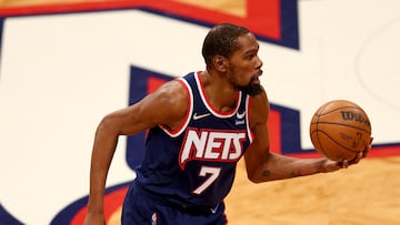 (FILES) In this file photo taken on April 25, 2022, Kevin Durant, #7 of the Brooklyn Nets, reacts during Game Four of the Eastern Conference First Round Playoffs against the Boston Celtics at Barclays Center in the Brooklyn borough of New York City. - Durant has told Brooklyn Nets owner Joe Tsai that he must choose between keeping Durant or head coach Steve Nash and general manager Sean Marks, The Athletic reported on August 8, 2022. (Photo by ELSA / GETTY IMAGES NORTH AMERICA / AFP)