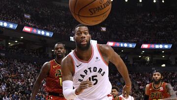 Jan 8, 2019; Toronto, Ontario, CAN;  Toronto Raptors center Greg Monroe (15) chases after a loose ball in the second half against Atlanta Hawks at Scotiabank Arena. Mandatory Credit: Dan Hamilton-USA TODAY Sports