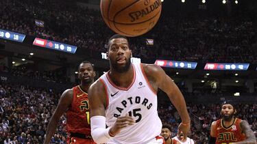 Jan 8, 2019; Toronto, Ontario, CAN; Toronto Raptors center Greg Monroe (15) chases after a loose ball in the second half against Atlanta Hawks at Scotiabank Arena. Mandatory Credit: Dan Hamilton-USA TODAY Sports