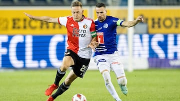 Luzern (Switzerland), 05/08/2021.- Dejan Sorgic (R) of FC Luzern fights for the ball with Jens Toornstra (L) of Feyenoord Rotterdam during the UEFA Europa Conference League third qualifying round 1st leg match between FC Luzern and Feyenoord Rotterdam at