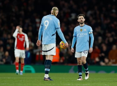 Los jugadores del City, Bernardo Silvay  Erling Haaland.