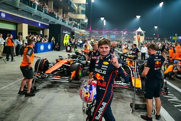 Red Bull Racing's Dutch driver Max Verstappen reacts after taking the pole position at the end of the qualifying session ahead of the Abu Dhabi Formula One Grand Prix at the Yas Marina Circuit in Abu Dhabi on December 6, 2025. (Photo by Andrej ISAKOVIC / AFP)