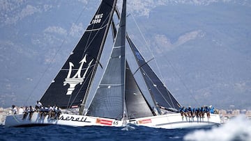 Fotografía cedida por la Copa del Rey de Vela de Mapfre del cruce entre los barcos Magical Mystery Tour (d) y Maserati, primer lugar y segundo lugar respectivamente de la clase ORC 1, durante el cuarto día de la 35 Copa del Rey de Vela Mapfre que se celebra en la bahía de Palma.