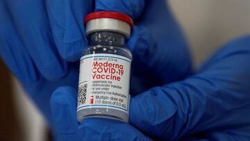 FILE PHOTO: An employee shows the Moderna coronavirus disease (COVID-19) vaccine at Northwell Health's Long Island Jewish Valley Stream hospital in New York, U.S., December 21, 2020. REUTERS/Eduardo Munoz/File Photo/File Photo
