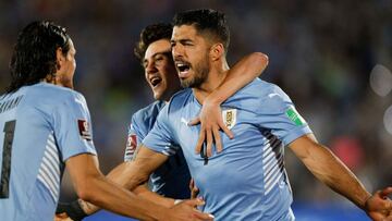 Uruguay&#039;s Luis Suarez (C) celebrates after scoring against Venezuela during the South American qualification football match for the FIFA World Cup Qatar 2022 at the Centenario stadium in Montevideo, on February 1, 2022. (Photo by MARIANA GREIF / POOL