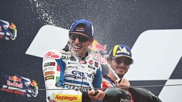 (From L) Second placed Ducati Lenovo Team's Italian rider Francesco Bagnaia and winner Gresini Racing MotoGP's Spanish rider Marc Marquez celebrate on the podium after the MotoGP race at the Misano World Circuit Marco-Simoncelli in Misano Adriatico on September 8, 2024. (Photo by Gabriel BOUYS / AFP)