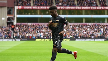 Soccer Football - Premier League - Aston Villa v Arsenal - Villa Park, Birmingham, Britain - February 18, 2023 Arsenal's Bukayo Saka celebrates scoring their first goal REUTERS/Hannah Mckay EDITORIAL USE ONLY. No use with unauthorized audio, video, data, fixture lists, club/league logos or 'live' services. Online in-match use limited to 75 images, no video emulation. No use in betting, games or single club /league/player publications.  Please contact your account representative for further details.