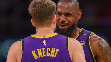 LOS ANGELES, CALIFORNIA - NOVEMBER 19: LeBron James #23 of the Los Angeles Lakers celebrates his dunk with teammate Dalton Knecht #4 while playing the Utah Jazz during the fourth quarter of the Emirates NBA Cup at Crypto.com Arena on November 19, 2024 in Los Angeles, California. NOTE TO USER: User expressly acknowledges and agrees that, by downloading and or using this photograph, User is consenting to the terms and conditions of the Getty Images License Agreement. Harry How/Getty Images/AFP (Photo by Harry How / GETTY IMAGES NORTH AMERICA / Getty Images via AFP)
