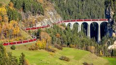 The Swiss railway industry managed to run the longest train in the world over difficult terrain. It was made up of 100 wagons and measured over a mile long.