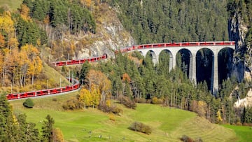 The Swiss railway industry managed to run the longest train in the world over difficult terrain. It was made up of 100 wagons and measured over a mile long.