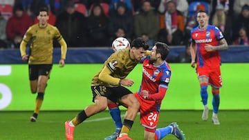 Real Sociedad's Spanish defender #12 Javi Lopez (L) and Viktoria Plzen's Czech defender #24 Milan Havel vie for the ball during the UEFA Europa League football match between Viktoria Plzen and Real Sociedad in Plzen, on November 7, 2024. (Photo by Michal CIZEK / AFP)
