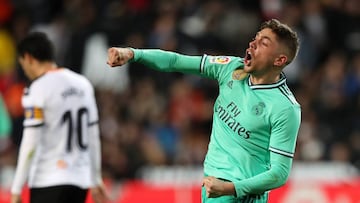 VALENCIA, SPAIN - DECEMBER 15: Fede Valverde of Real Madrid celebrates his team&#039;s equaliser goal scored by teammate Karim Benzema (not in frame) during the Liga match between Valencia CF and Real Madrid CF at Estadio Mestalla on December 15, 2019 in 