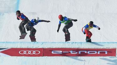 Italy's Kalle Koblet, Austria's Lukas Pachner, Spain's Lucas Eguibar and Mick Dierdorff of the US compete in the men's snowboard cross during the FIS Snowboard Cross World Cup 2022, part of a 2022 Beijing Winter Olympic Games test event at the Genting Sno