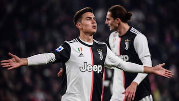 Juventus&#039; Argentine forward Paulo Dybala celebrates after opening the scoring during the Italian Serie A football match Juventus vs AC Milan on November 10, 2019 at the Juventus Allianz stadium in Turin. (Photo by Marco Bertorello / AFP)