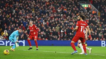 Soccer Football - Premier League - Liverpool v Newcastle - Anfield, Liverpool, Britain - January 1, 2024 Liverpool's Mohamed Salah scores their first goal REUTERS/Carl Recine NO USE WITH UNAUTHORIZED AUDIO, VIDEO, DATA, FIXTURE LISTS, CLUB/LEAGUE LOGOS OR 'LIVE' SERVICES. ONLINE IN-MATCH USE LIMITED TO 45 IMAGES, NO VIDEO EMULATION. NO USE IN BETTING, GAMES OR SINGLE CLUB/LEAGUE/PLAYER PUBLICATIONS.