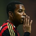 (FILES) AC Milan's Brazilian forward Robinho gestures during the seria A football match AC Milan vs Sampdoria, on Septembre 28, 2013, in San Siro stadium in Milan. Former Manchester City and Real Madrid striker Robinho will serve a nine-year rape sentence, imposed on him by an Italian court, in Brazil, judges in Brasilia ruled on March 20, 2024. The court decided by nine votes to two in favor of an Italian request that Robinho be jailed in his home country after he was found guilty of taking part in the gang rape of an Albanian woman celebrating her 23rd birthday at a Milan nightclub in 2013. (Photo by Olivier MORIN / AFP)