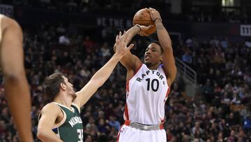 Dec 12, 2016; Toronto, Ontario, CAN;  Toronto Raptors guard DeMar DeRozan (10) shoots for a basket over Milwaukee Bucks forward Mirza Teletovic (35) during the second half at Air Canada Centre. The Raptors won 122-100. Mandatory Credit: Dan Hamilton-USA TODAY Sports