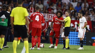 Marcelo se tuvo que retirar lesionado del partido ante el Sevilla.