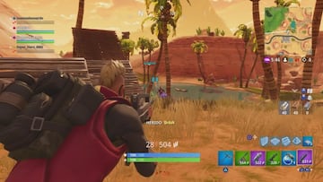 Haciendo daño a enemigos con el fusil de asalto en Fortnite Battle Royale