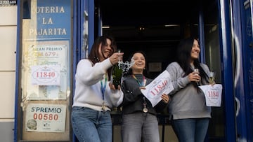 MADRID, SPAIN - DECEMBER 22: Employees of the administration 'La Pajarita' located in Alcala street, on 22 December, 2024 18 celebrate that they have sold part of the number 40,014 corresponding to the Second Prize of the Extraordinary Draw of the Christmas Lottery 2024 and part of the number 11,840 corresponding to the Third Prize of the Christmas Lottery 2024, on 22 December, 2024 on December 22, on 22 December, 2024 2024, on 22 December, 2024 in Madrid, Spain. The State distributes today a total of 2,702 million euros in prizes, which means 112 million more than last year. For this draw 193 million Christmas Lottery tickets have been put on sale. This year the issue consists of 193 series (eight more than last year) of 100,000 numbers each, and amounts to 3,860 million euros, of which 70% will be distributed in prizes. (Photo By Alejandro Martinez Velez/Europa Press via Getty Images)