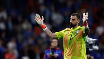 Italy's goalkeeper #01 Gianluigi Donnarumma reacts after the UEFA Euro 2024 Group B football match between Spain and Italy at the Arena AufSchalke in Gelsenkirchen on June 20, 2024. (Photo by KENZO TRIBOUILLARD / AFP)