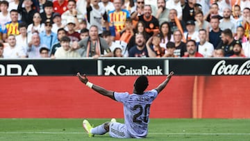 Real Madrid's Brazilian forward Vinicius Junior reacts during the Spanish league football match between Valencia CF and Real Madrid CF at the Mestalla stadium in Valencia on May 21, 2023. (Photo by JOSE JORDAN / AFP)