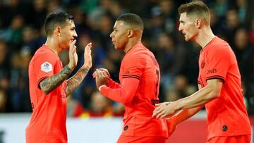 Soccer Football - Ligue 1 - AS Saint-Etienne v Paris St Germain - Stade Geoffroy-Guichard, Saint-Etienne, France - December 15, 2019 Paris St Germain's Kylian Mbappe celebrates scoring their second goal with teammates REUTERS/Emmanuel Foudrot