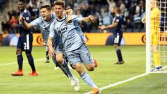 KANSAS CITY, KANSAS - APRIL 27: Krisztian Nemeth #9 of Sporting Kansas City celebrates with Kelyn Rowe #11 after scoring during the second half of the game against the New England Revolution at Children&#039;s Mercy Park on April 27, 2019 in Kansas City, Kansas.   Jamie Squire/Getty Images/AFP
 == FOR NEWSPAPERS, INTERNET, TELCOS &amp; TELEVISION USE ONLY ==