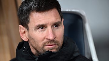 Inter Miami's Argentine forward Lionel Messi sits on the bench before the start of the friendly football match between Inter Miami of the US's Major League Soccer league and Vissel Kobe of Japan's J-League at the National Stadium in Tokyo on February 7, 2024. (Photo by Philip FONG / AFP)