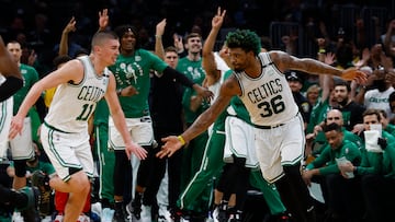 May 15, 2022; Boston, Massachusetts, USA; Boston Celtics guard Marcus Smart (36) and guard Payton Pritchard (11) celebrate after a three point basket against the Milwaukee Bucks during the second half of game seven of the second round of the 2022 NBA playoffs at TD Garden. Mandatory Credit: Winslow Townson-USA TODAY Sports