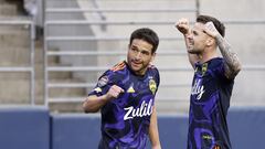 SEATTLE, WASHINGTON - APRIL 06: Albert Rusn�k #11 of Seattle Sounders celebrates a goal with Cristian Roldan #7 against New York City FC during the first half during the CONCACAF Champions League Semifinals at Lumen Field on April 06, 2022 in Seattle, Washington.   Steph Chambers/Getty Images/AFP
== FOR NEWSPAPERS, INTERNET, TELCOS & TELEVISION USE ONLY ==