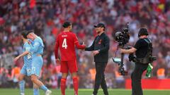 Klopp and Virgil van Dijk at Wembley. (Photo by Catherine Ivill/Getty Images)