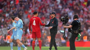 Klopp and Virgil van Dijk at Wembley. (Photo by Catherine Ivill/Getty Images)